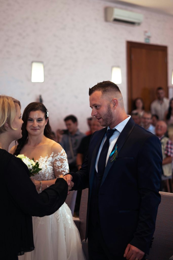 Bride and groom participating in a Church of Christ wedding ceremony