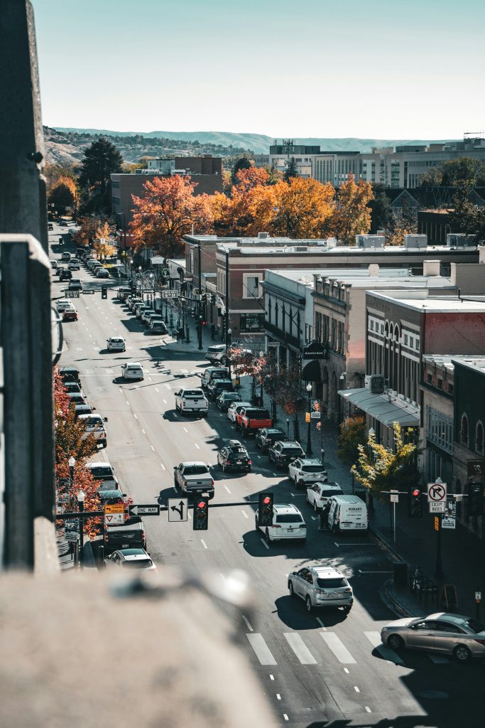 Downtown street in Idaho with fall colors and local businesses near Churches of Christ in Idaho