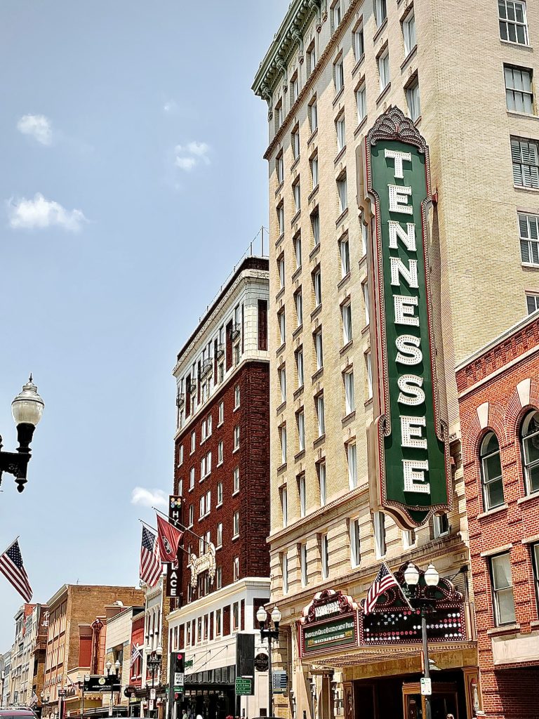 Historic Tennessee Theatre building in downtown with vintage signage.